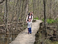 Jacob Wheeler; Kat Wheeler; Ellery Wheeler; in the woods at FLCC