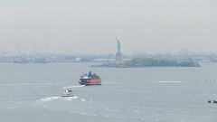 Statue of Liberty as seen from Brooklyn Bridge New York NY