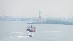 Statue of Liberty as seen from Brooklyn Bridge New York NY