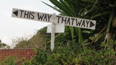 sign <-- This way That Way -->