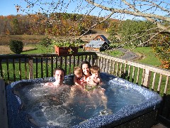 Ben Dorrough; Ellery Wheeler; Katherine (Kat) McDougal Wheeler McCandless; Jacob Wheeler; in the hot tub at Moose Lodge