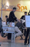 Ruth Bennett McDougal Dorrough; getting a massage at Rochester Airport