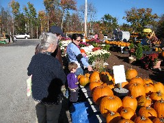Ruth Dorrough; Ben Dorrough; Jacob Wheeler; Kat Wheeler; pumpkins; across the street from the Pumpkin chunkin Trebuchet