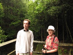 Ben Dorrough; Ruth Dorrough; behind Ben s cabin