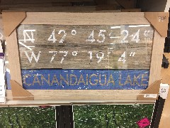 sign North 42 deg 45 min 24 seconds, 
West 77 deg 19 min 4 seconds
Canandaigua Lake