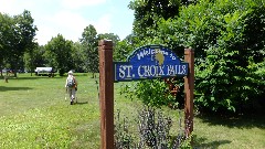 IAT
Ruth Bennett McDougal Dorrough; 
sign Welcome to St Croix Falls, WI